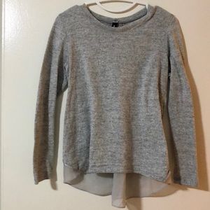 sweater with chiffon blouse and zipper detail